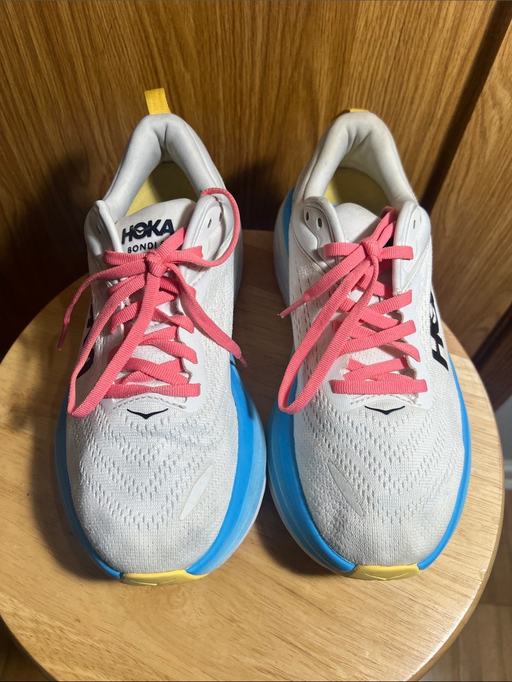 Hoka Women's White Athletic Shoes with Pink Laces and Blue Soles